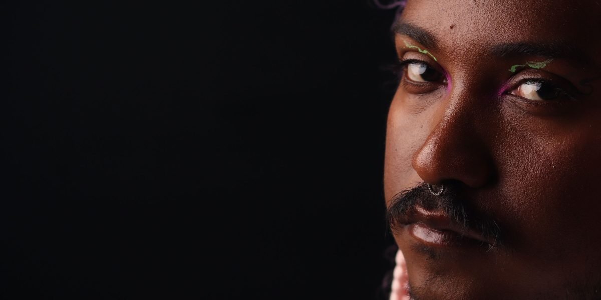 An individual exploring different emotional expressions, representing an actor's versatility in diverse roles.
